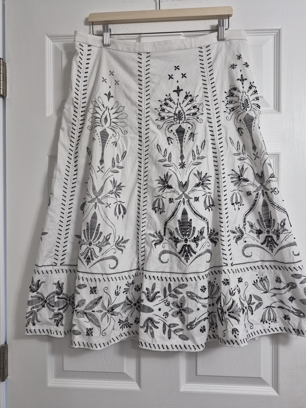 White Embroidered Midi Skirt with Black Floral Motif